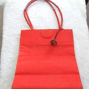 The brave  brown bag orange